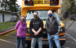 Fir Grove staff members and student